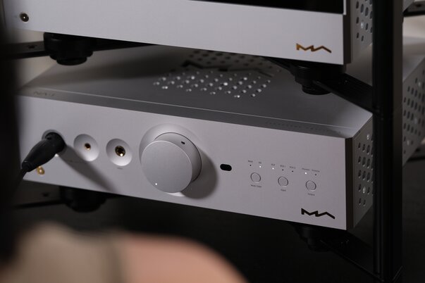 Close-up photo of Matrix NA-1 Headphone Amp with cable plugged into front panel headphone jack. 