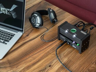 Chord Electronics Anni Amplifier connected to Sennheiser Headphones