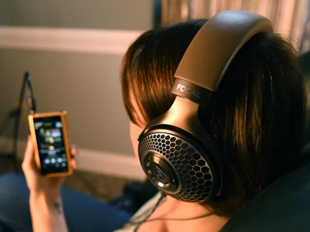 woman wearing Focal Clear MG Headphones