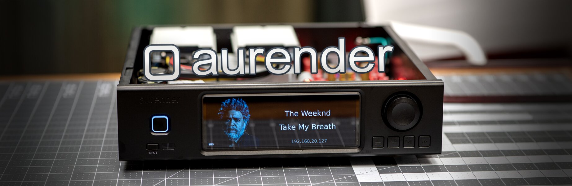 Aurender A200 music streamer with top panel removed and the weeknd take my breath away album displayed on front panel 