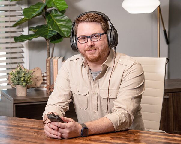 Ricky Kovacs wearing Audeze Mobius Headphones