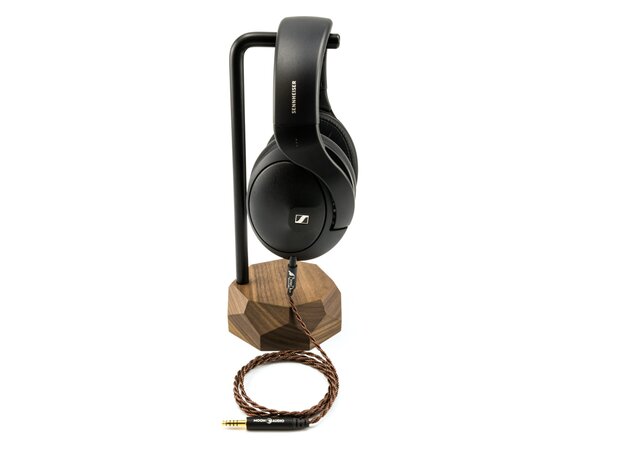 sennheiser headphone on headphone stand connected to a dragon audio cable