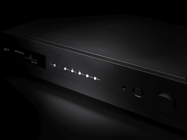 close up of black Bartok apex on black surface with dark background