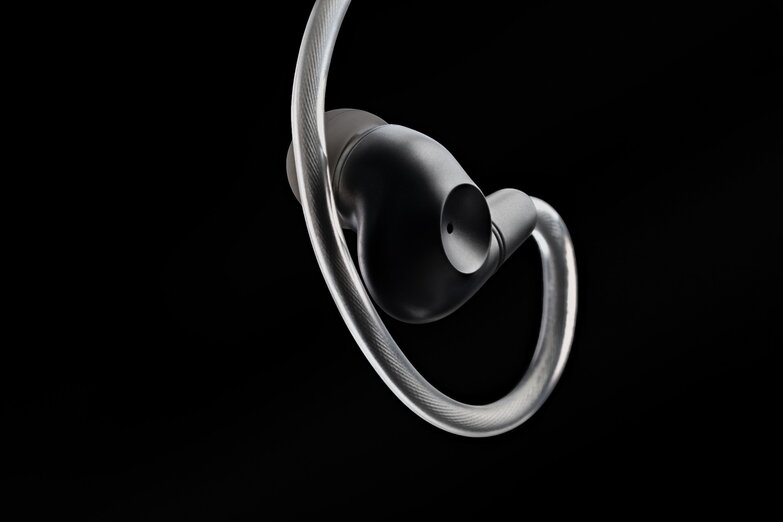 ASTRU Dynamic Driver IEMs earbud with the cable ear attachment end