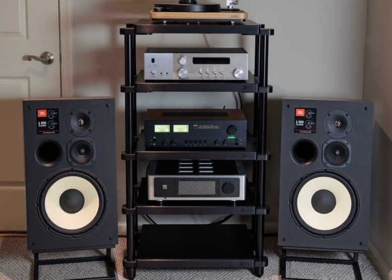 exr stand with amps and speakers on both sides