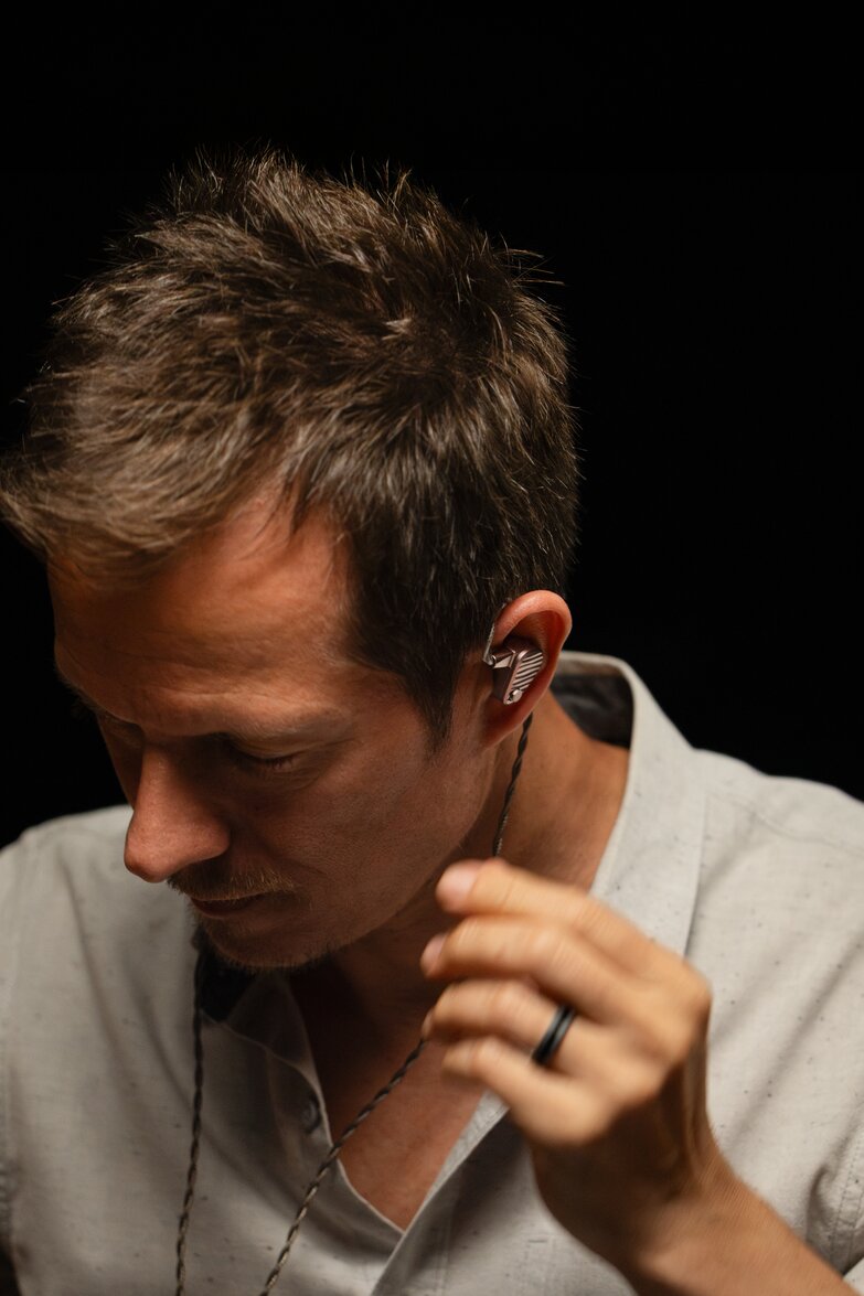 man with ocean iems in