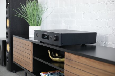 C 3030S Stereophonic Amplifier on entertainment center further away