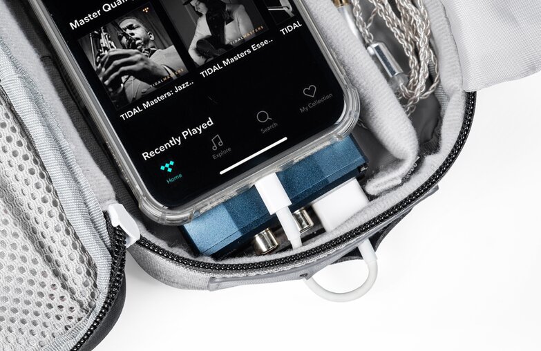 close up of phone in itraveller csase with cable coming out of whole in case connecting to phone