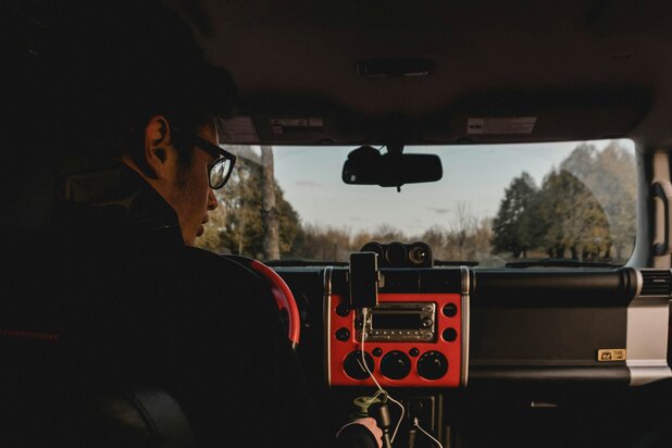 man driving car 