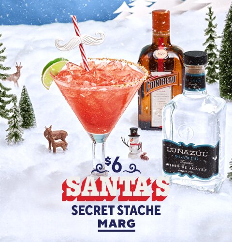 Chili's December Margarita of the Month, Santa's Secret Stache Marg, in a glass with bottles.