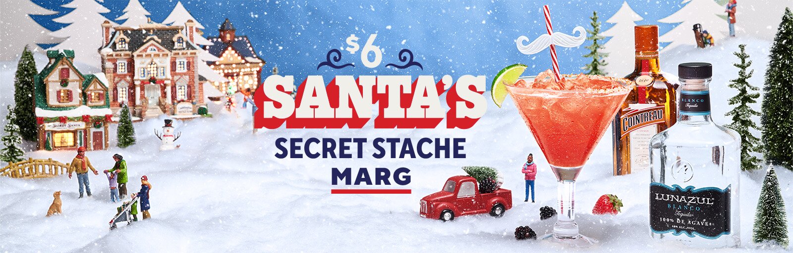 Chili's December Margarita of the Month, Santa's Secret Stache Marg, in a glass with bottles.