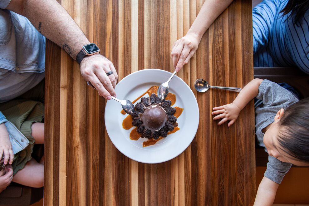 Family enjoying Mini Molten Chocolate Cake at Chili's