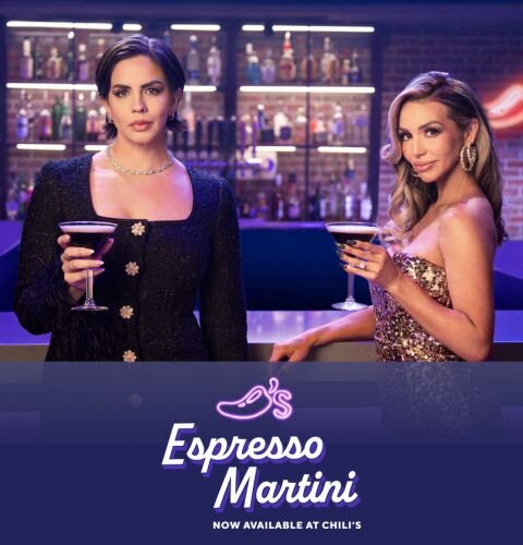 Scheana Shay and Katie Maloney holding Chili's Espresso Martini in front of Chili's bar