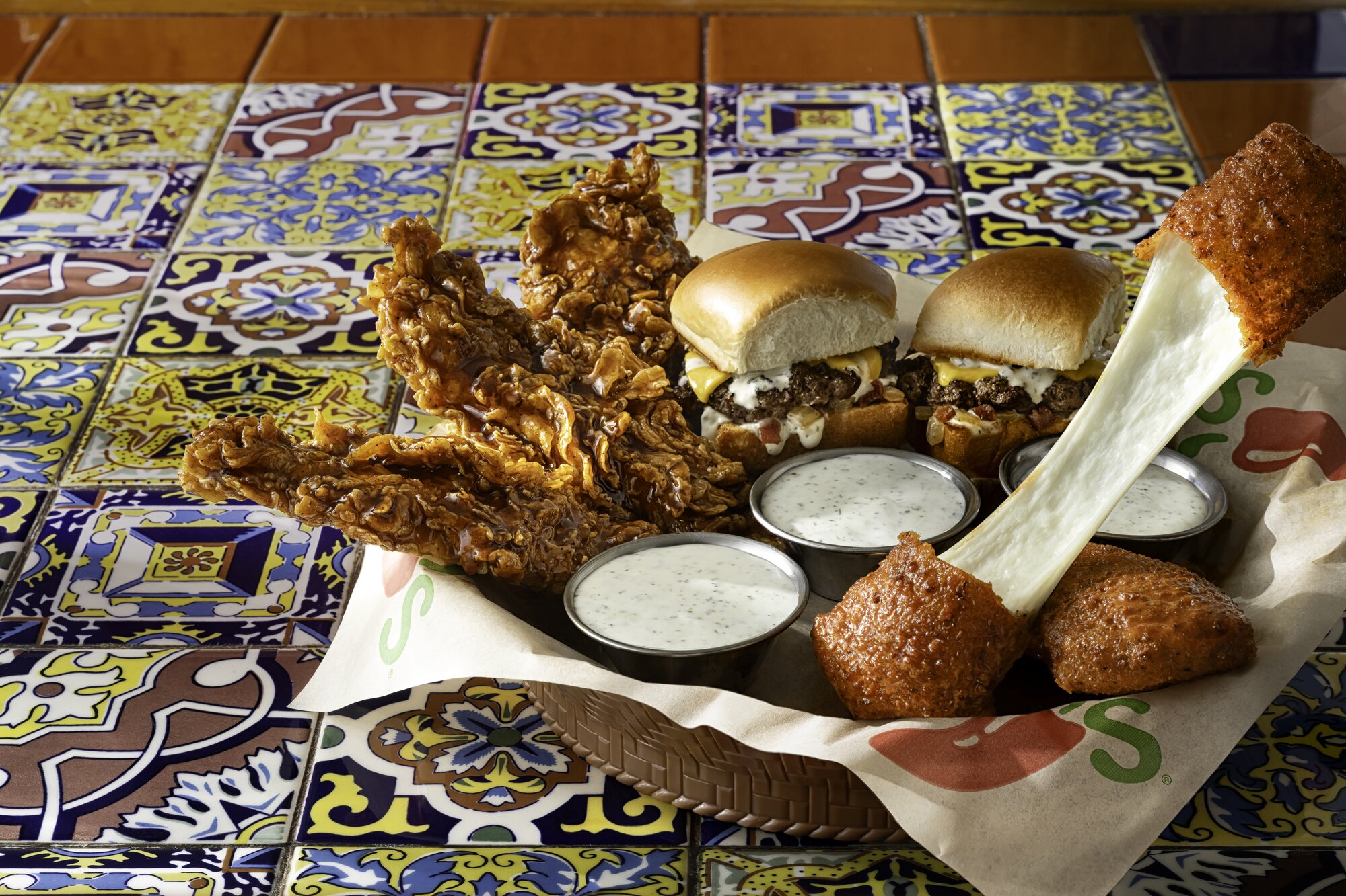 Chili's Viral Triper Dipper with Honey-Chipotle Chicken Crispers, Big Mouth® Bites and Fried Mozzarella