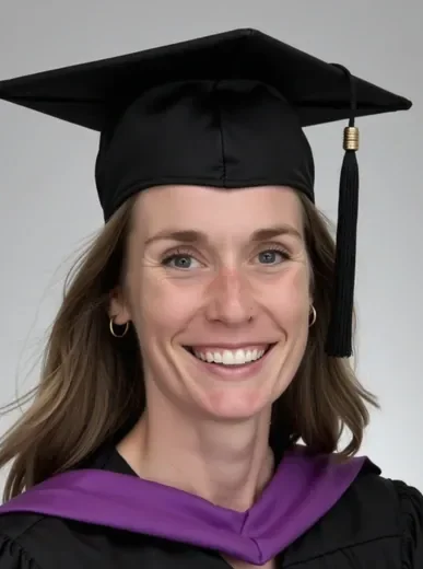 AI graduation portrait of a person in professional academic regalia, polished headshot framing suitable for LinkedIn or formal announcements