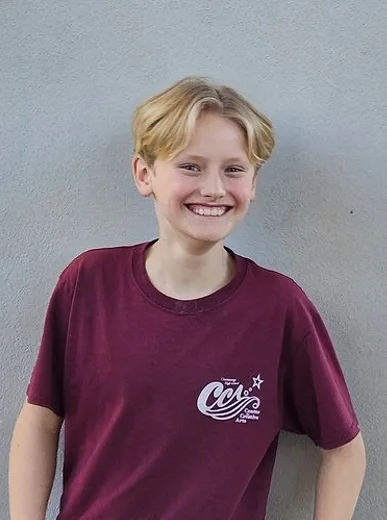 Outdoor casual photo of a man on a regular day with natural background