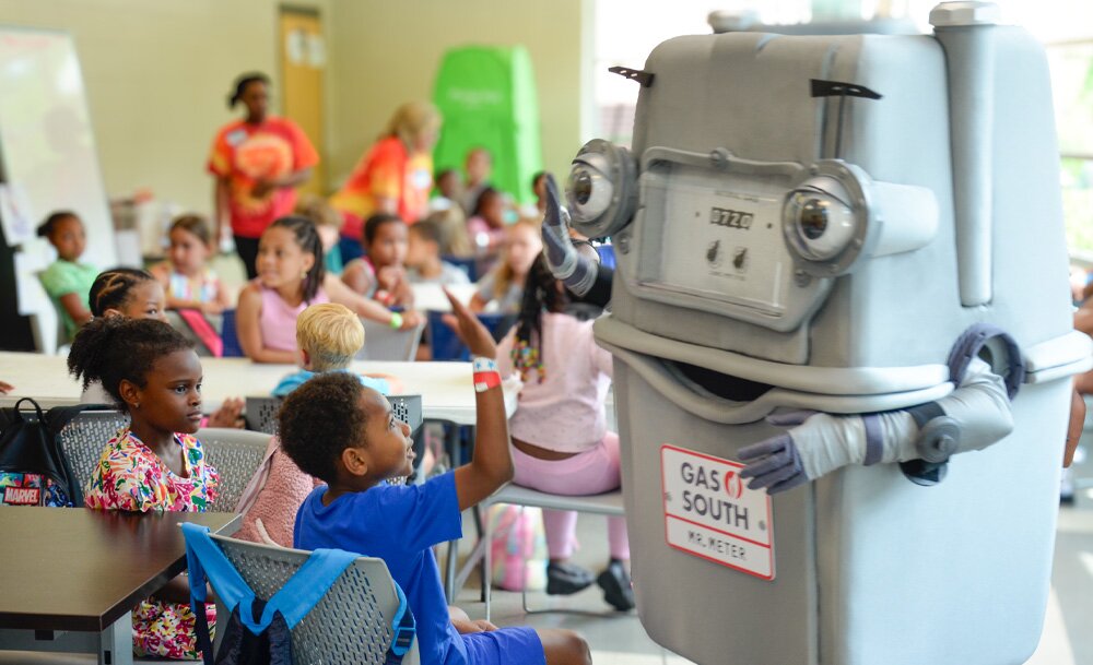 Mr. Meter volunteers at school event