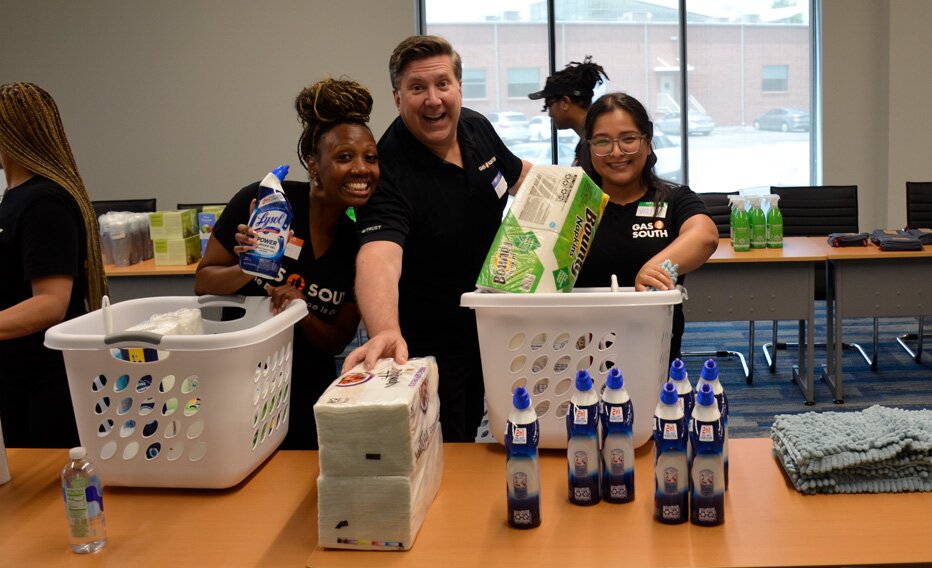 gas south team packs baskets full of supplies