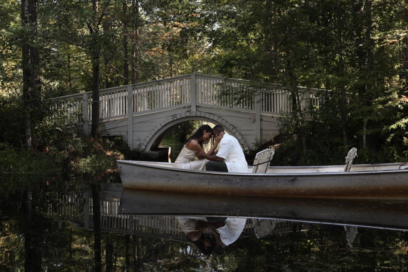 A happy couple in love on a romantic date in a boat