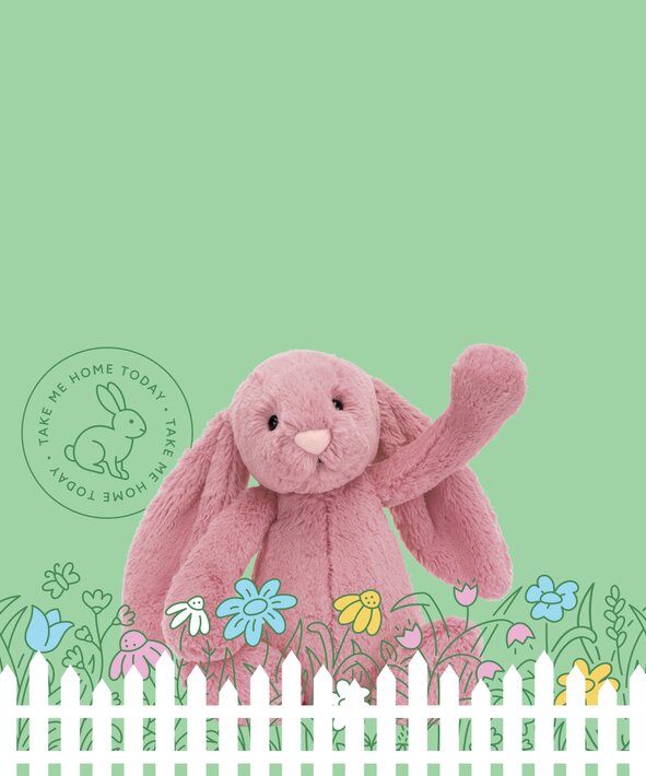 Image of a pink Jellycat bunny on a green background, surrounded by illustrated flowers and a white picket fence