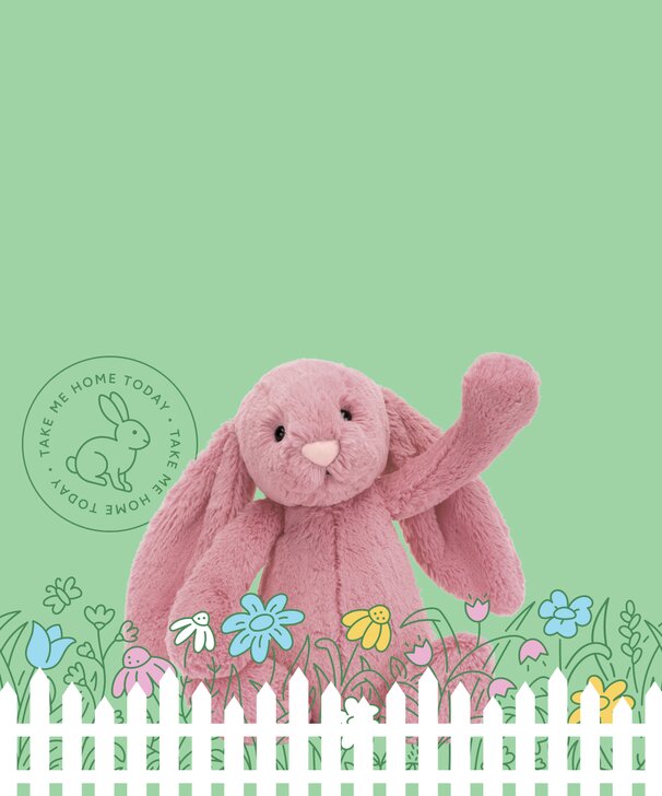 Image of a pink Jellycat bunny sitting behind an illustrated garden of flowers and white picket fence on a light green background