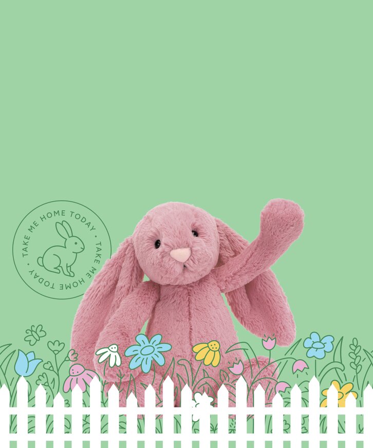 Image of a pink Jellycat bunny on a green background, surrounded by illustrated flowers and a white picket fence