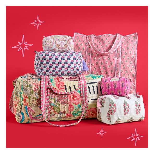 Collection of quilted totes, cosmetic bags and duffel on a red background