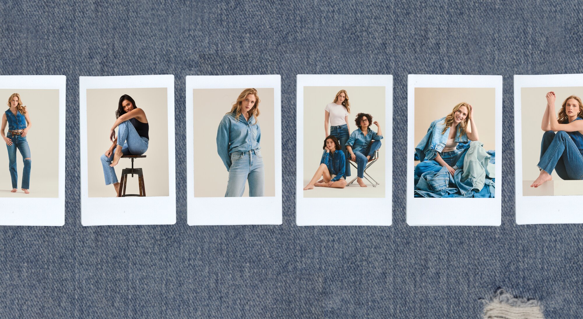 two models laying on a bed surrounded by valentine's day candy and valentine's jellycats. one model wearing a pink pajama set, the other wearing red striped boxer shorts and a white cardigan with a heart motif. 