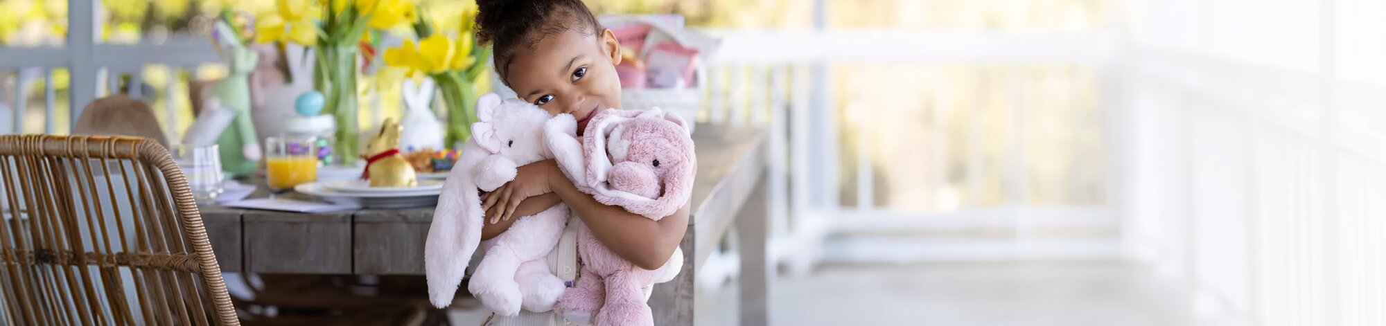 Image of Sapphire Laying Dragon Plush Toy on a plush blanket