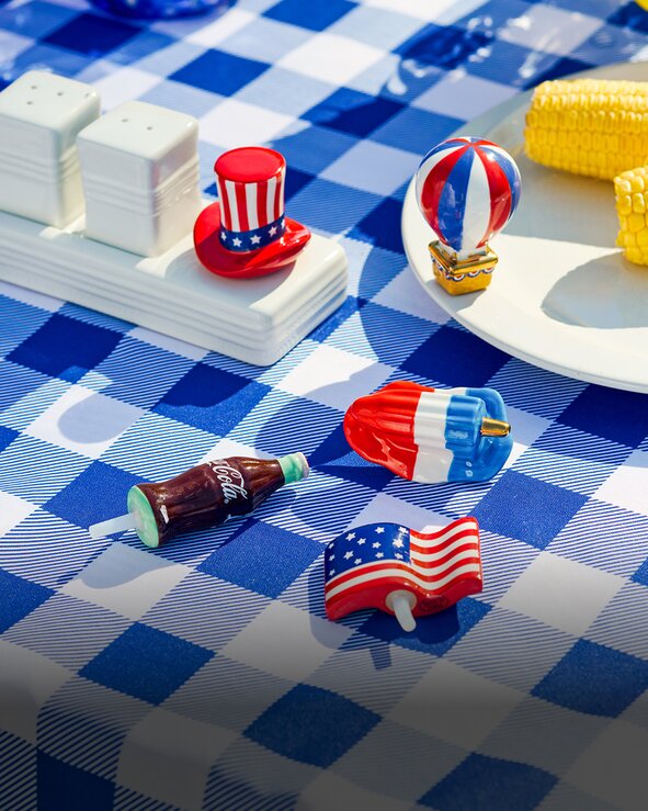Fourth of July Nora Fleming minis on a blue gingham tablecloth