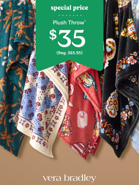 Vera Bradley tote bags sitting under a Christmas tree