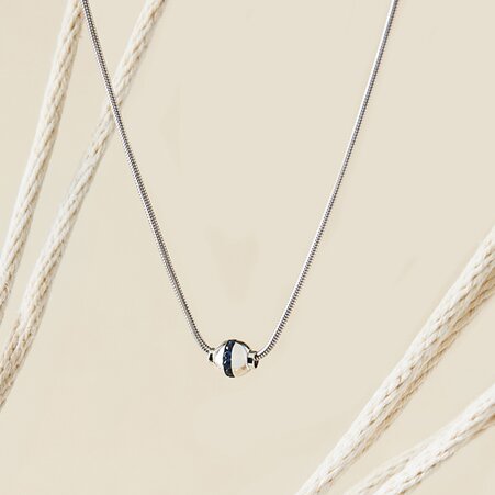 Cape Cod necklace category featuring a silver necklace with a signature bead pendant and nautical rope styling.
