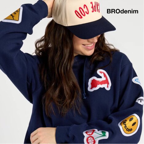 Image of a model wearing a BRODenim Cape Cod hat and sweatshirt