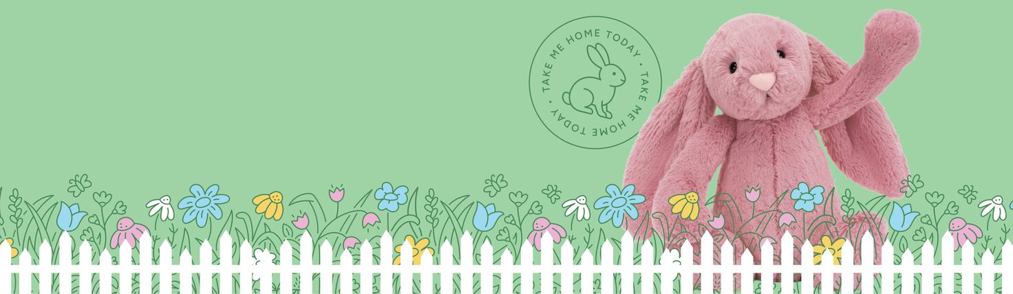 Image of a pink Jellycat bunny sitting behind an illustrated garden of flowers and white picket fence on a light green background