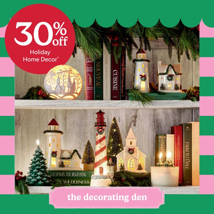 30% off Holiday Home Decor* - Image of Holiday LED houses, glitter lanterns, candles on a bookself
