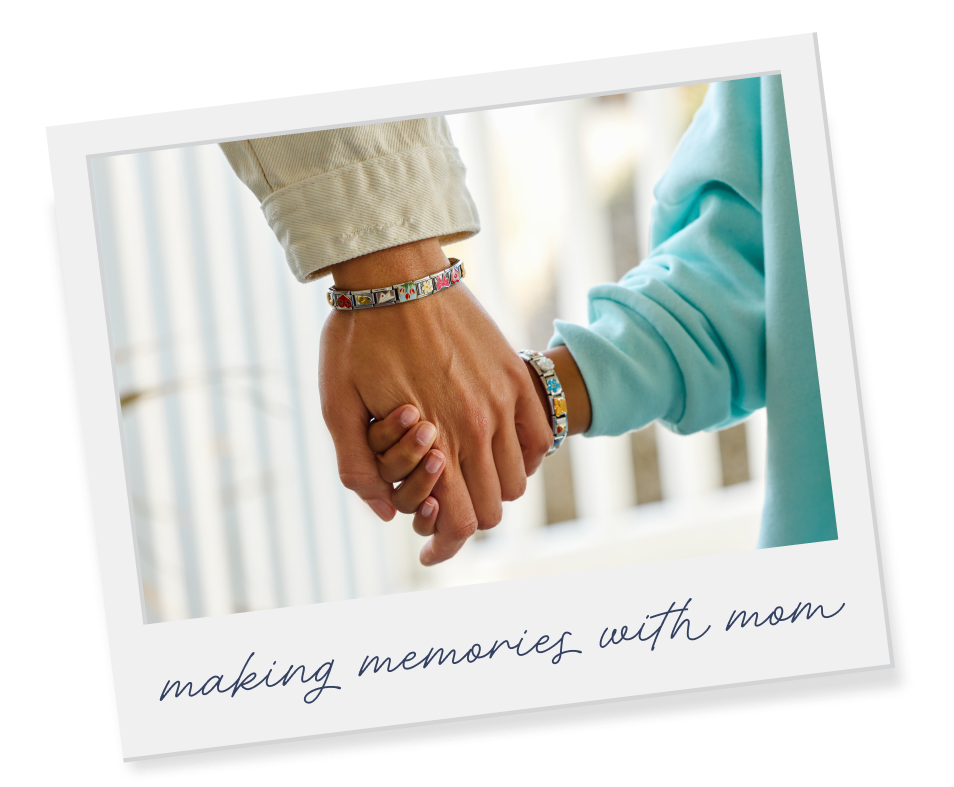 Polaroid image of a mom and daughter holding hands wearing My Italian Bracelets. Handwritten text underneath says "making memories with mom"