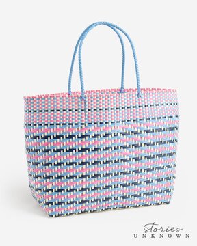 Image of Stories Unknown Plastic Woven Tote Bag in Blue and Pink