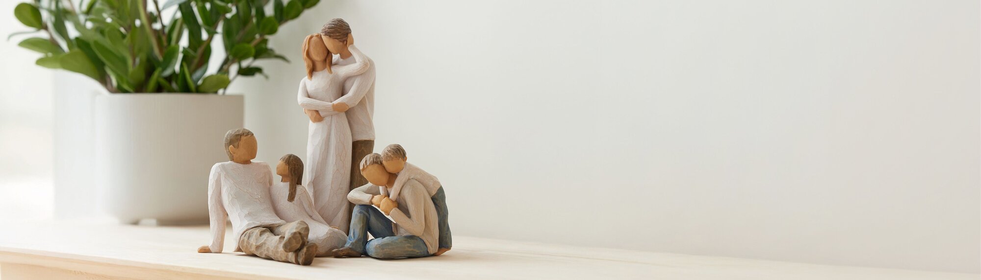 Image of various Willow Tree figurines including the Together Figurine, That's My Dad Figurine, and Father and Daughter Figurine