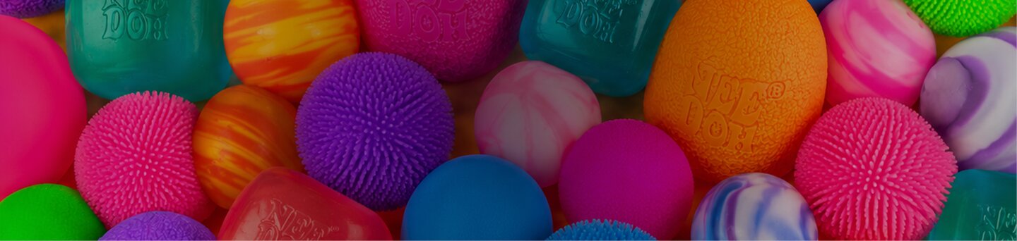 Colorful assortment of NeeDoh squishy sensory toys. Shop NeeDoh.