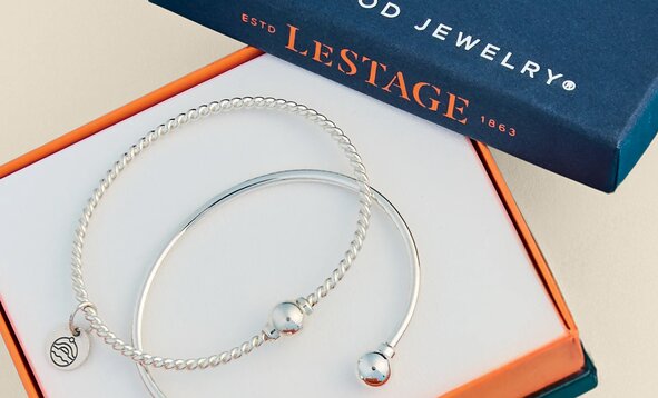 Two silver Cape Cod–style bracelets displayed in a gift box that reads LeStage.