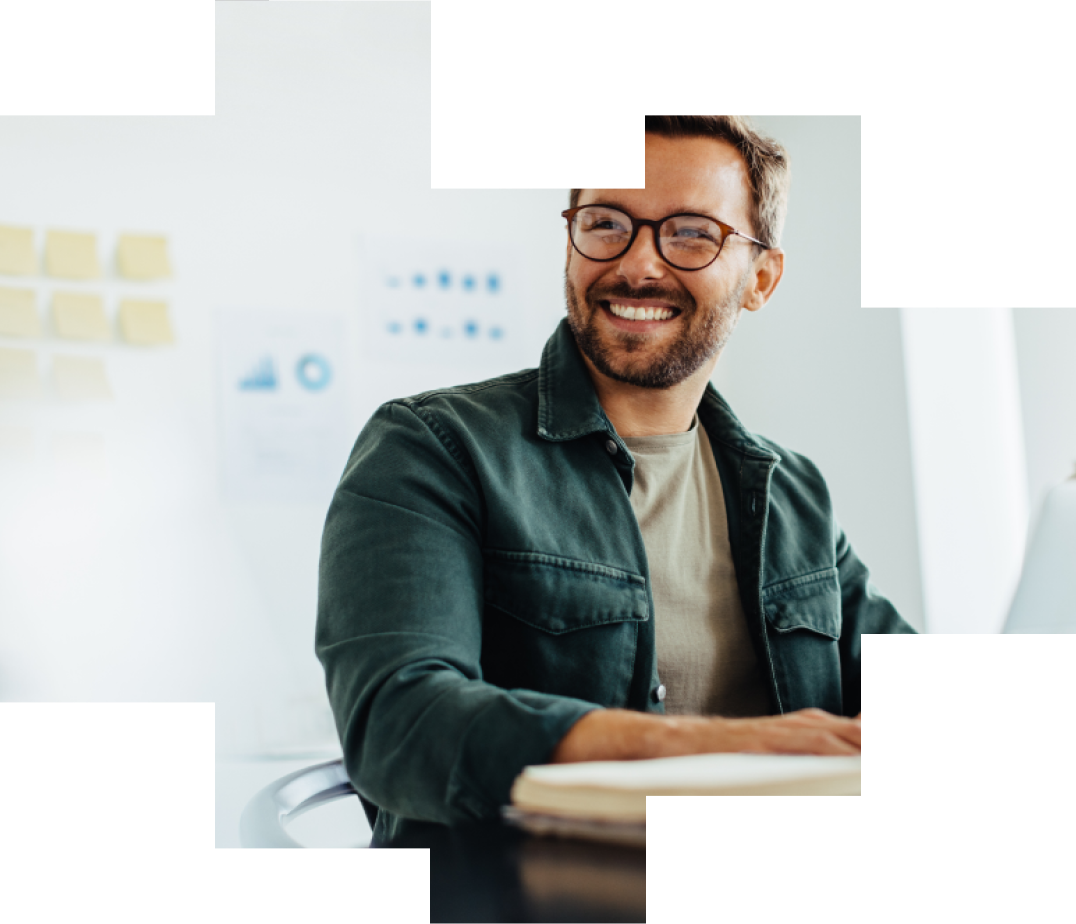 Man with glasses smiling