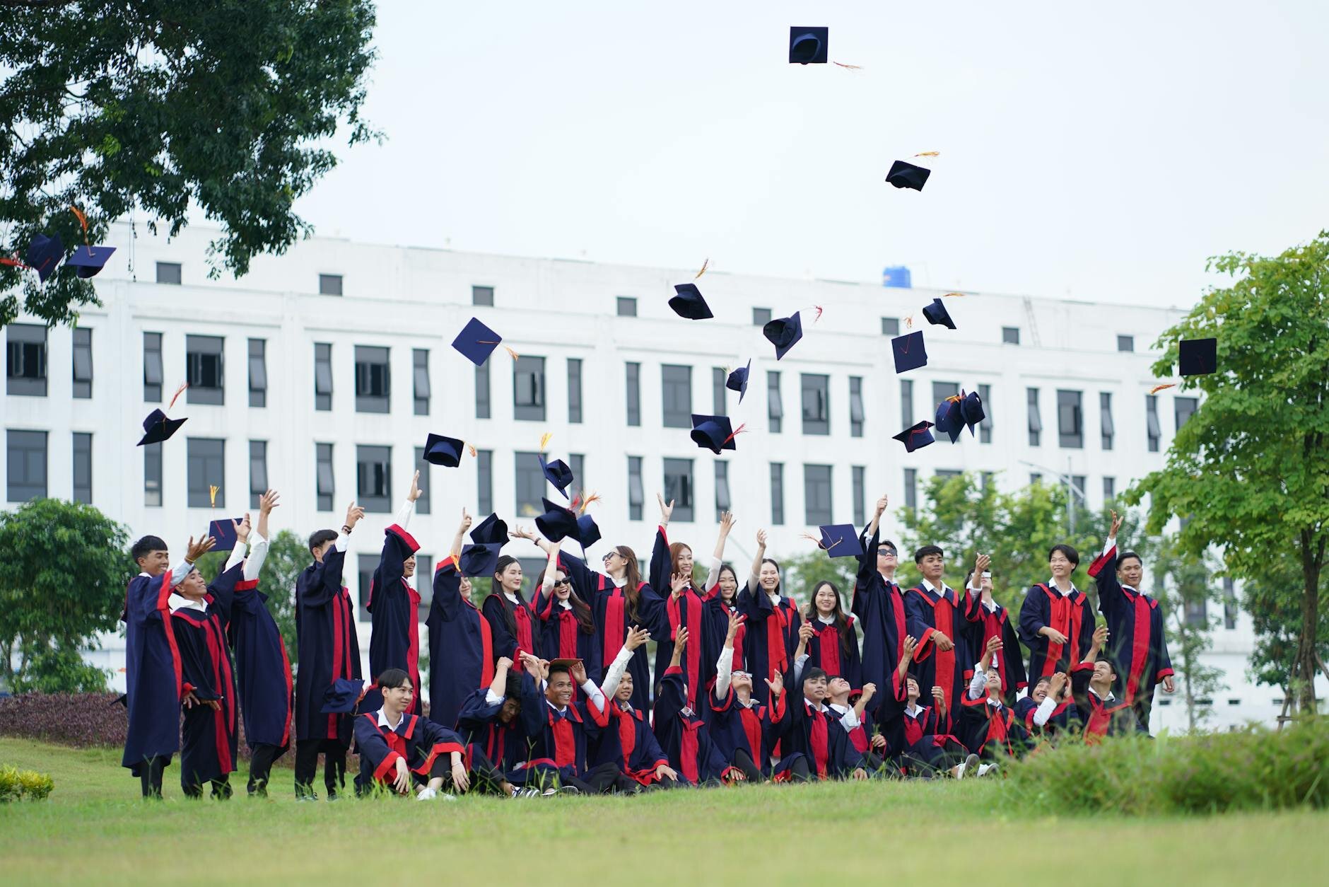 graduation class throwing hats