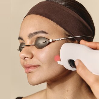 woman receiving resurfacing facial