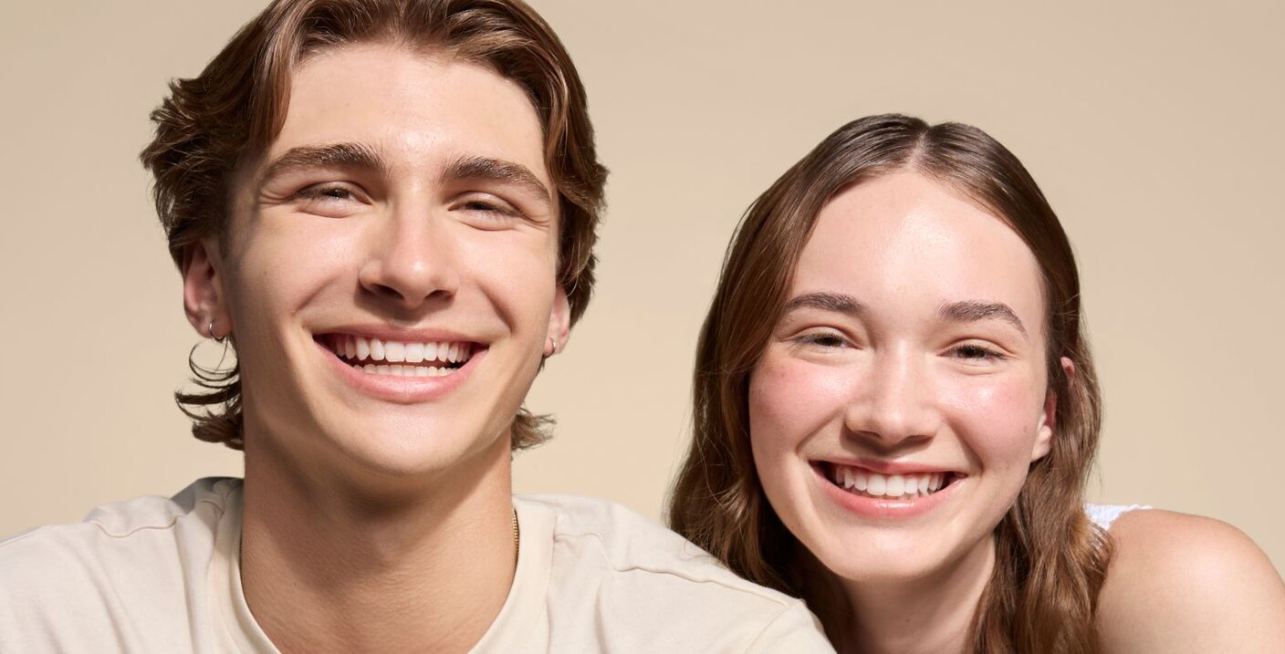 happy teens with clear skin