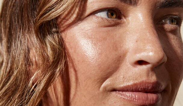 woman with clear skin posing