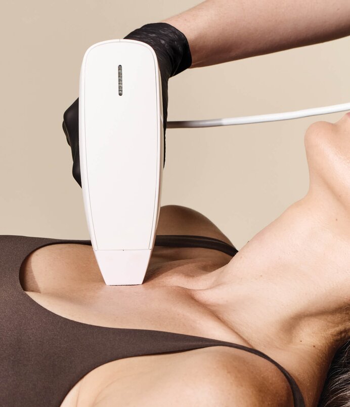 woman receiving resurfacing treatment on chest