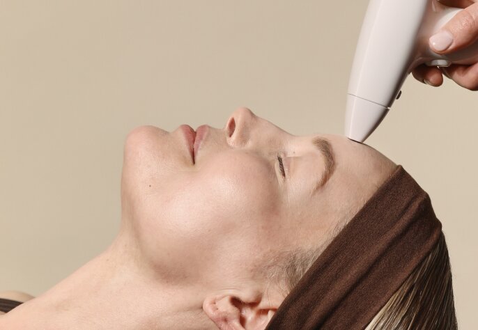 woman receiving a Resurfacing facial