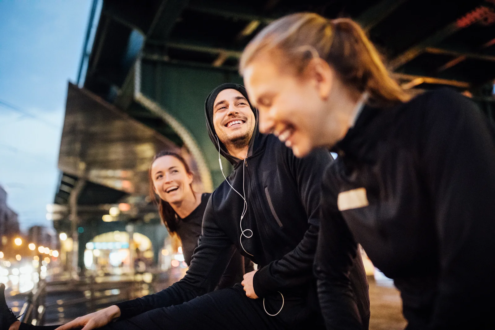 Colleagues running together after work