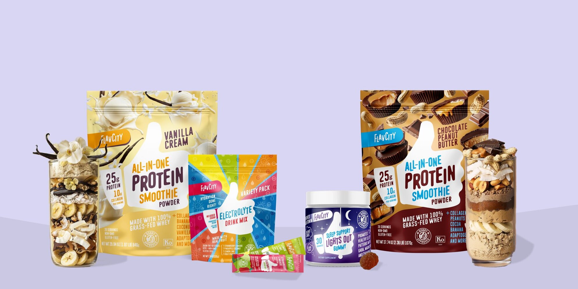 An assortment of Flav City products on a purple background with chocolate protein mix spilt out