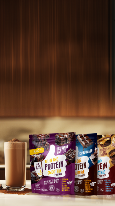 An assortment of Flav City products on a purple background with chocolate protein mix spilt out